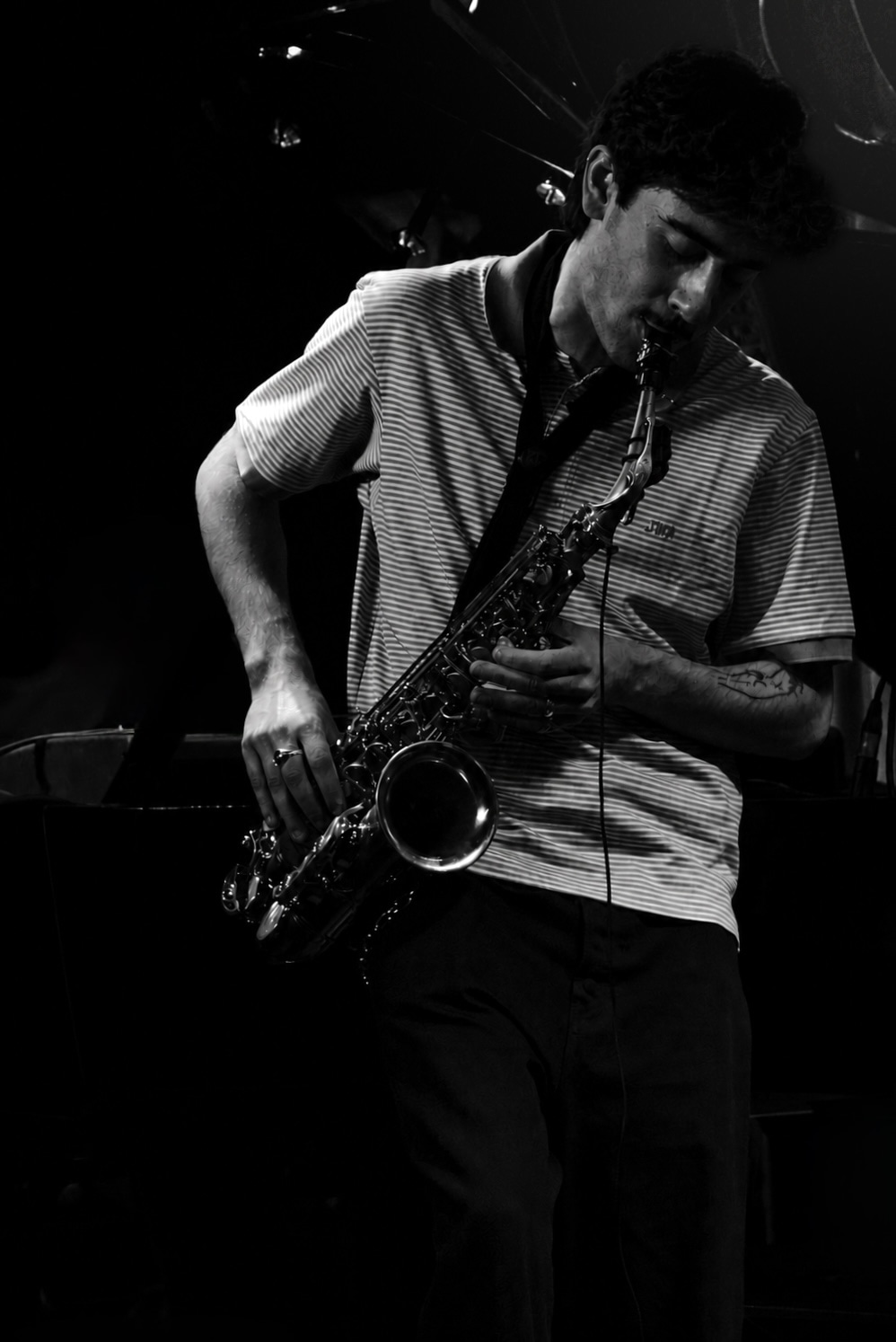 Saxophonist in concentrated performance