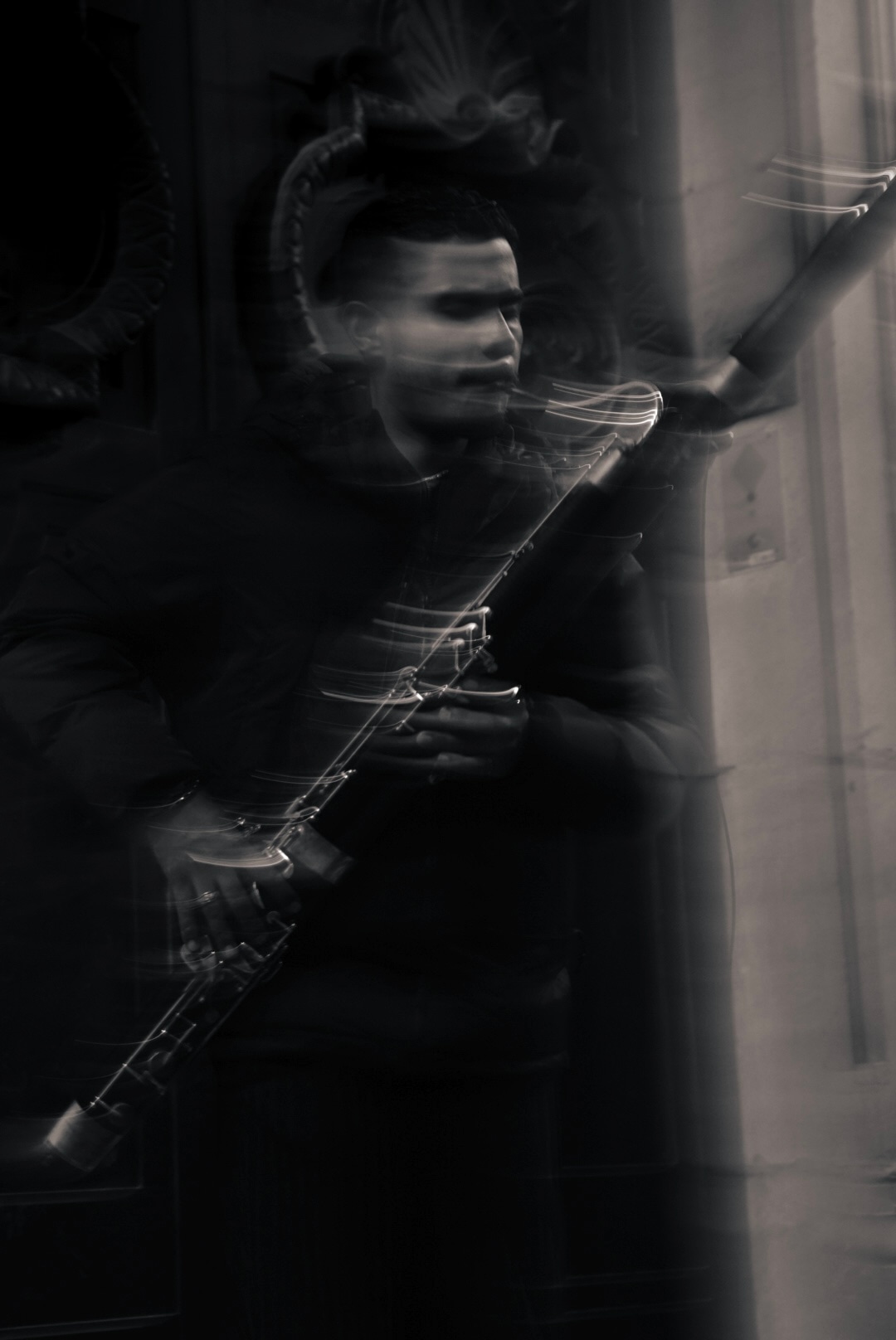 Guitarist with motion blur in the dark